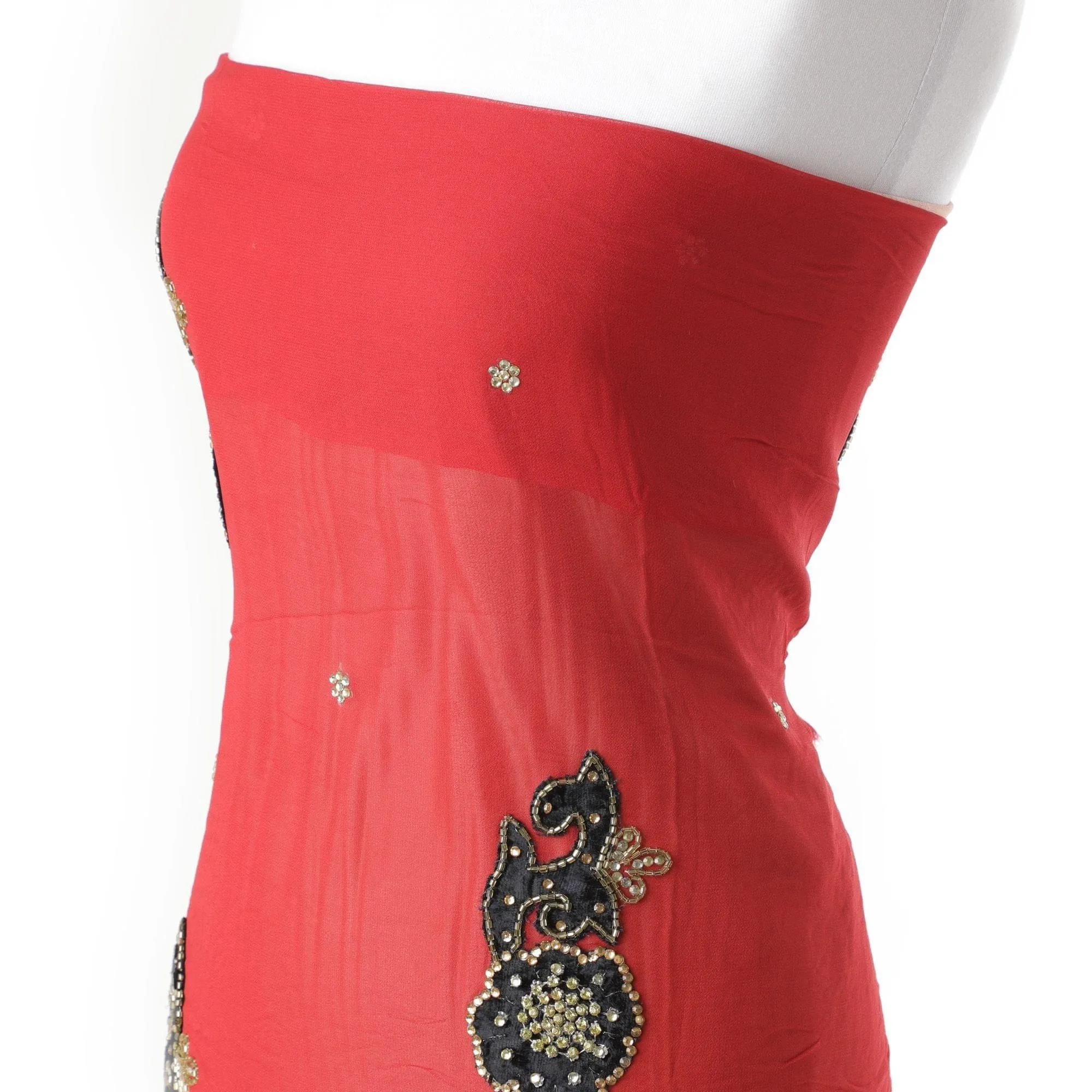 Fire brick red nylon tulle fabric with black velvet flock having golden bead work and stone work in floral design